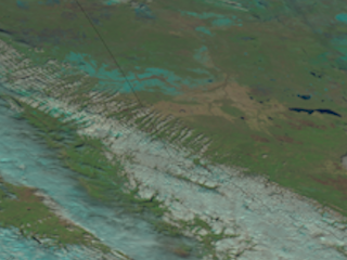 Clouds Roll Across The Canadian Rockies