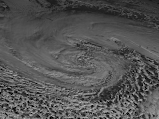 Clouds Swirl Within a Low Pressure System Over Northern Pacific Ocean