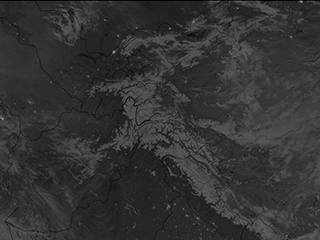 Full Moon Illuminates the Mountain Ranges of Central Asia